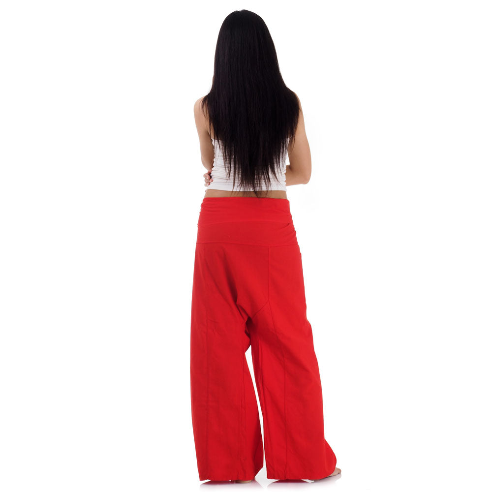 Back view of female model wearing Crimson Sunset women's Thai fisherman pants, showcasing the tied waist and flowing fabric.