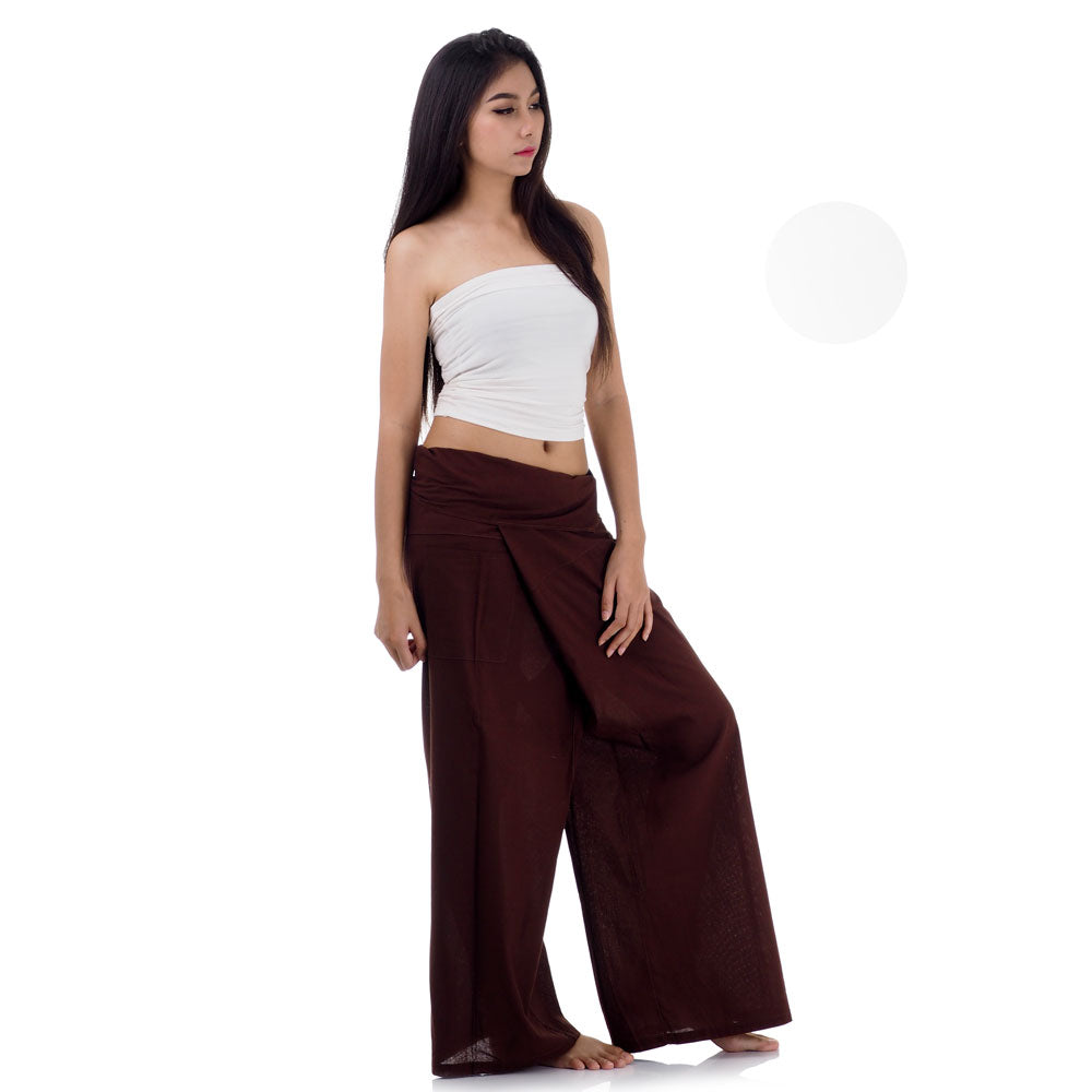 Side profile of a female model showing the relaxed fit and adjustable waistband of Earthy Brown Thai fisherman pants.