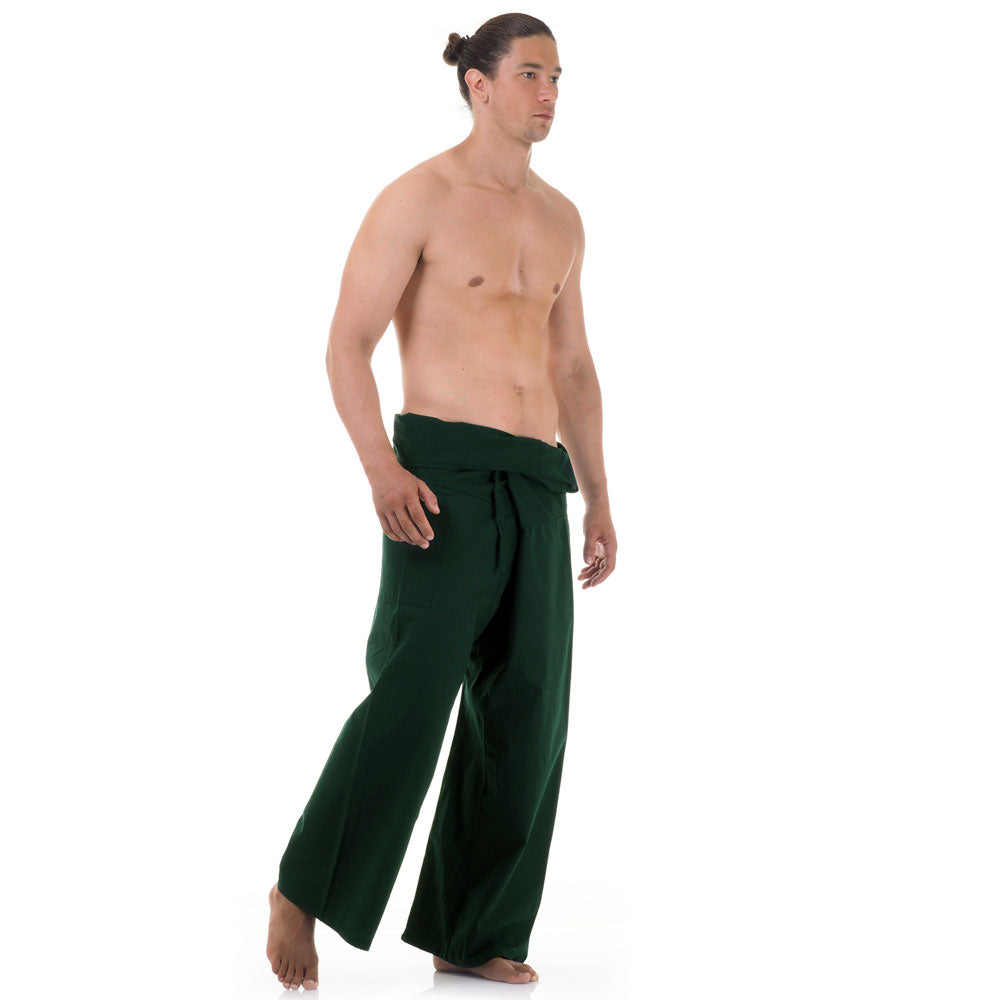 Side profile of a male model showing the relaxed fit and adjustable waistband of Forest Green Oasis Thai fisherman pants.