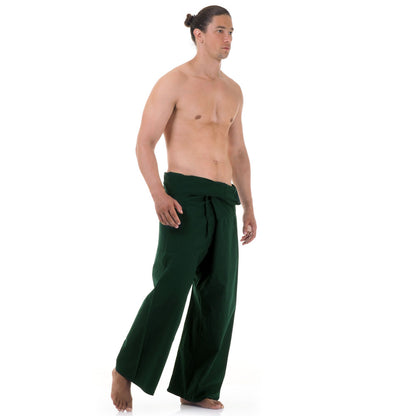 Side profile of a male model showing the relaxed fit and adjustable waistband of Forest Green Oasis Thai fisherman pants.