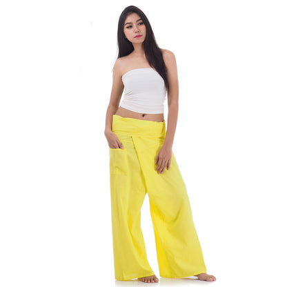 Front view of female model in Golden Sunshine Thai fisherman pants, one size fits all S-XL, classic Asian wrap style.