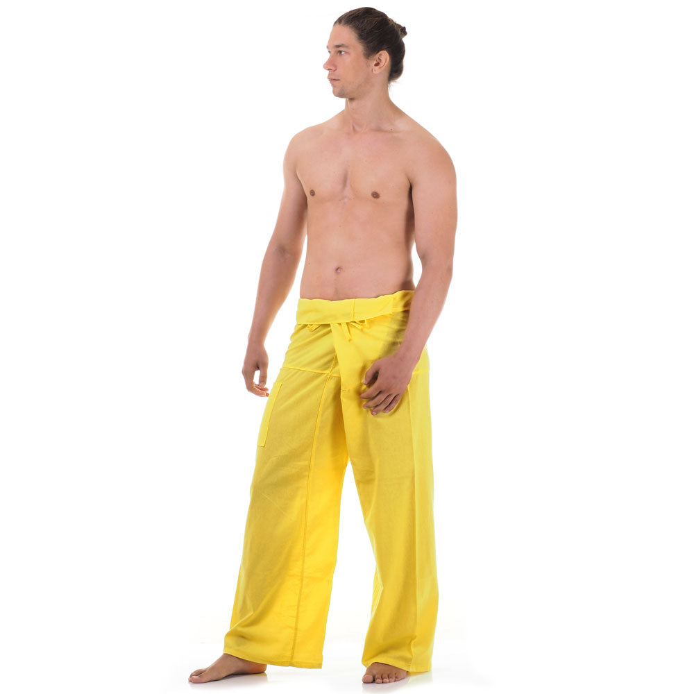 Side profile of a male model showing the relaxed fit and adjustable waistband of Golden Sunshine Thai fisherman pants.