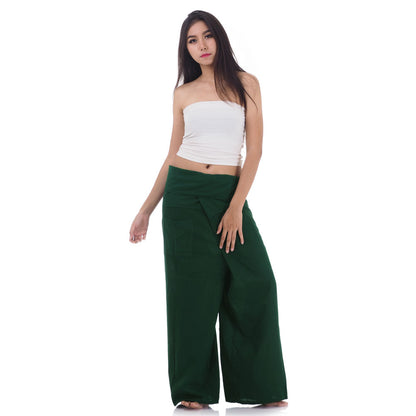 Front view of female model in Forest Green Oasis Thai fisherman pants, one size fits all S-XL, classic Asian wrap style.