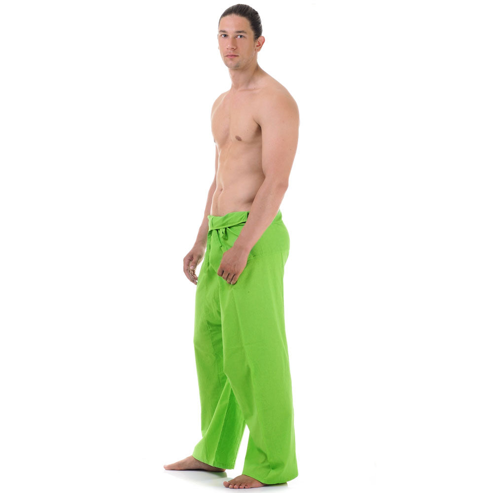 Side profile of a male model showing the relaxed fit and adjustable waistband of Tropical Lime Thai fisherman pants.