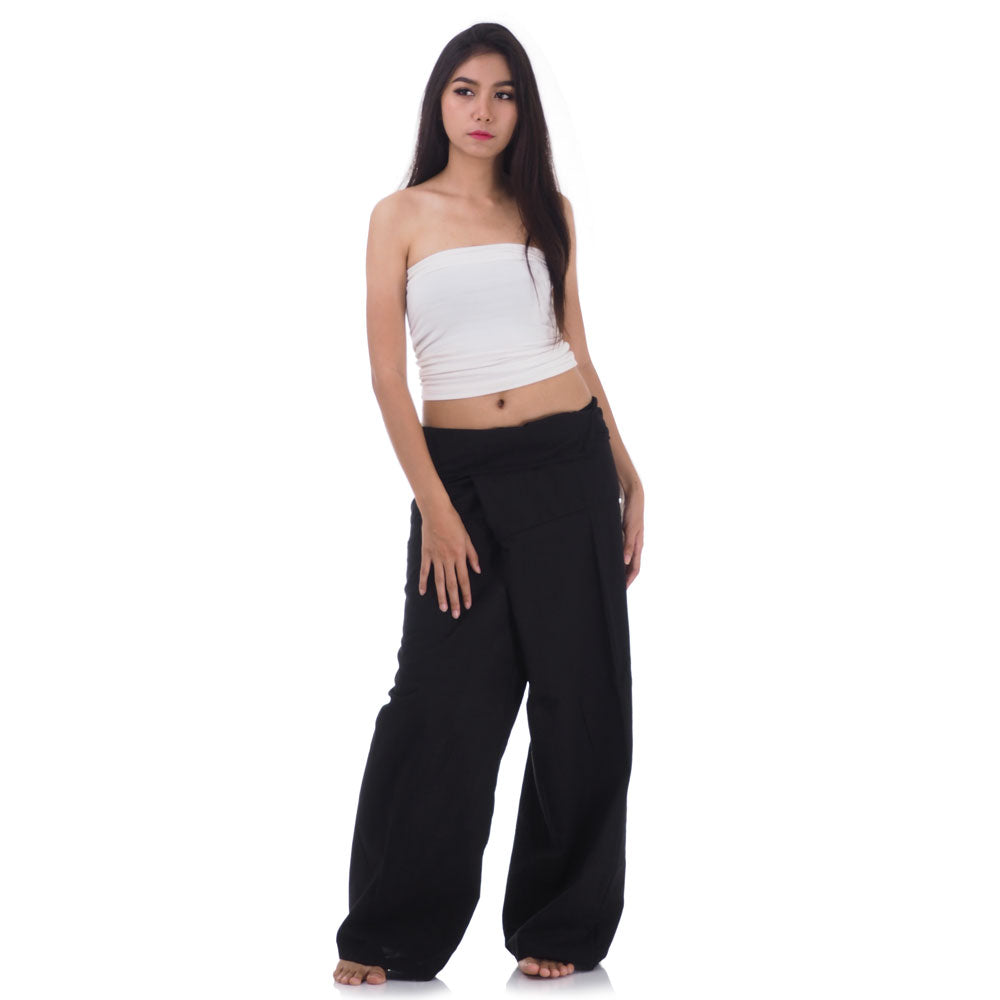 Front view of female model in Midnight Black Thai fisherman pants, one size fits all S-XL, classic Asian wrap style.
