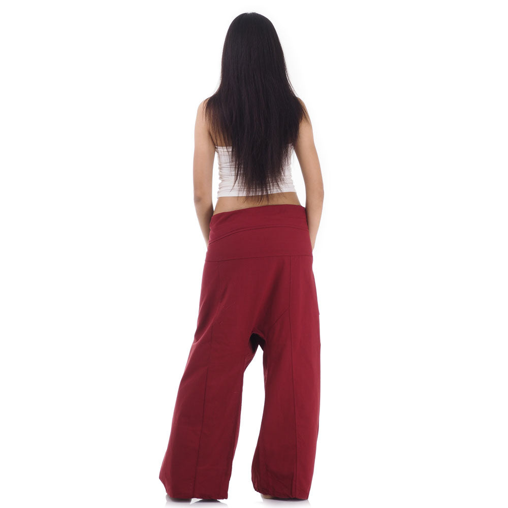 Back view of female model wearing Mystic Maroon women's Thai fisherman pants, showcasing the tied waist and flowing fabric.