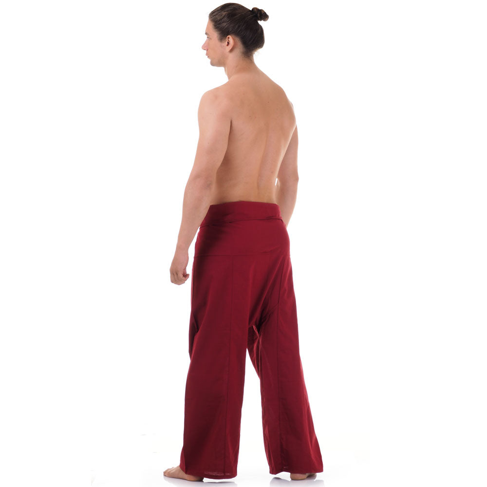 Back view of male model wearing Mystic Maroon men's Thai fisherman pants, showcasing the tied waist and flowing fabric.