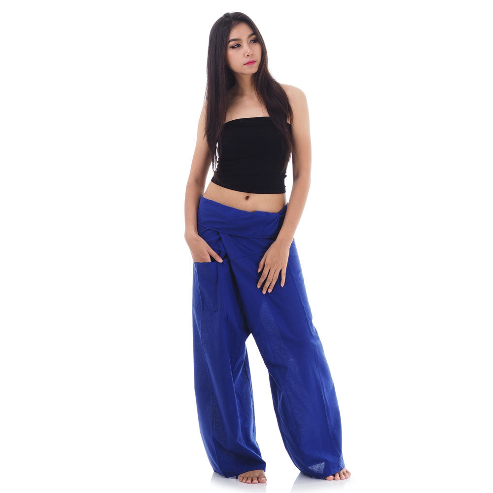 Front view of female model in Oceanic Navy Thai fisherman pants, one size fits all S-XL, classic Asian wrap style.