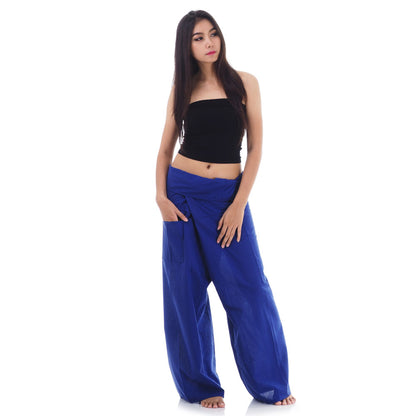 Front view of female model in Oceanic Navy Thai fisherman pants, one size fits all S-XL, classic Asian wrap style.