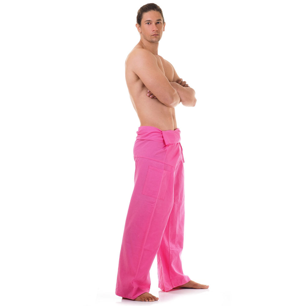 Side profile of a male model showing the relaxed fit and adjustable waistband of Pink Paradise Thai fisherman pants.