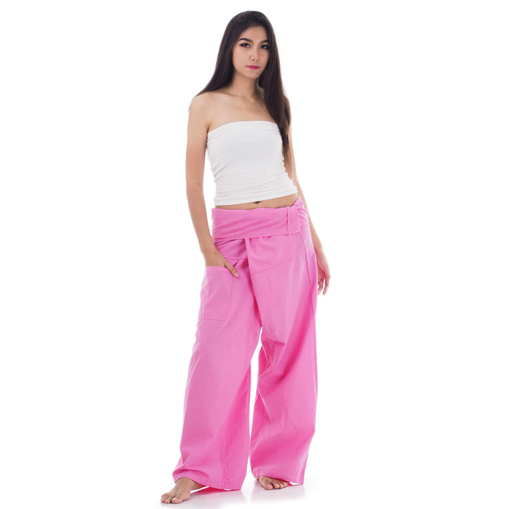 Front view of female model in Pink Paradise Thai fisherman pants, one size fits all S-XL, classic Asian wrap style.