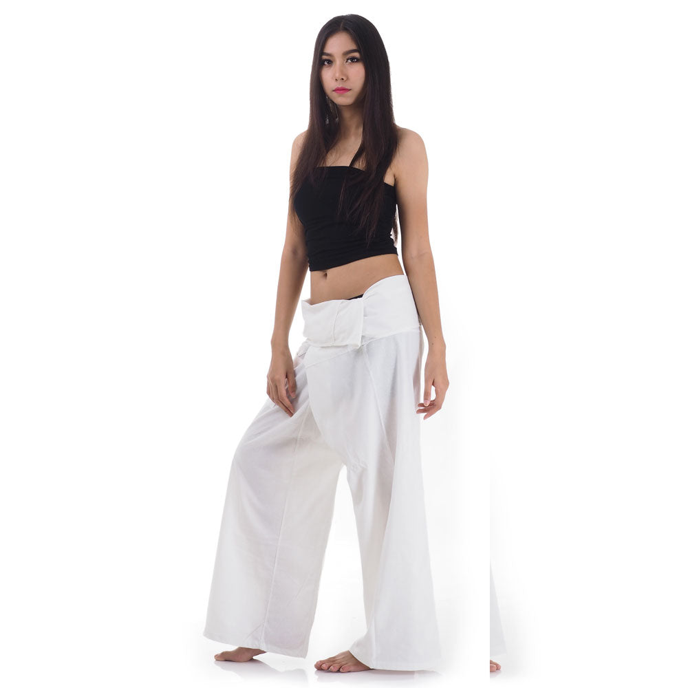 Side profile of a female model showing the relaxed fit and adjustable waistband of Pure White Sand Thai fisherman pants.