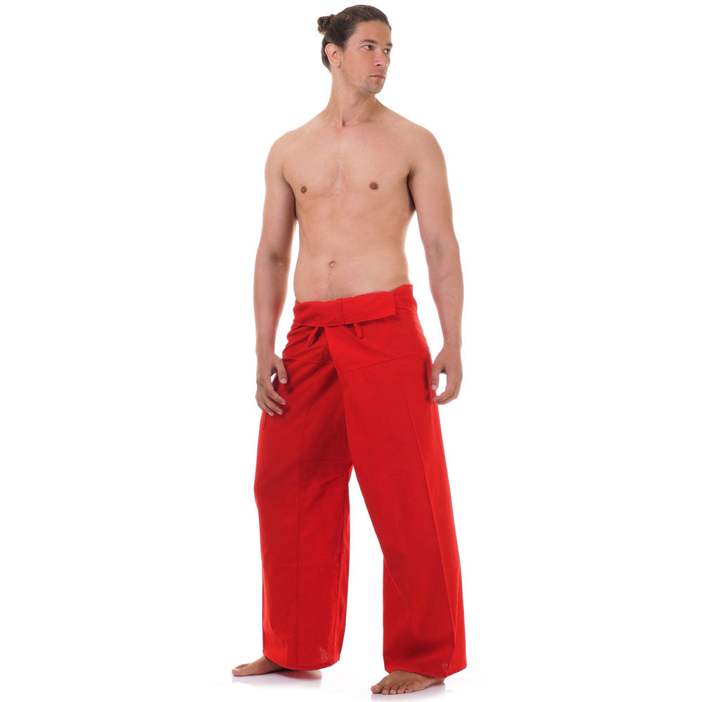 Side profile of a male model showing the relaxed fit and adjustable waistband of Crimson Sunset Thai fisherman pants.