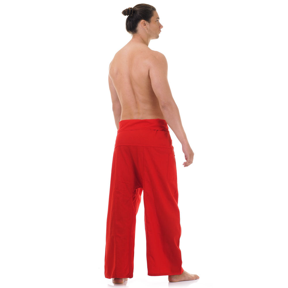 Back view of male model wearing Crimson Sunset men's Thai fisherman pants, showcasing the tied waist and flowing fabric.