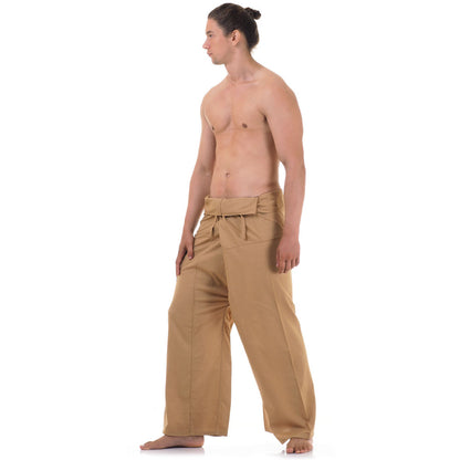 Side profile of a male model showing the relaxed fit and adjustable waistband of Sandy Beige Thai fisherman pants.