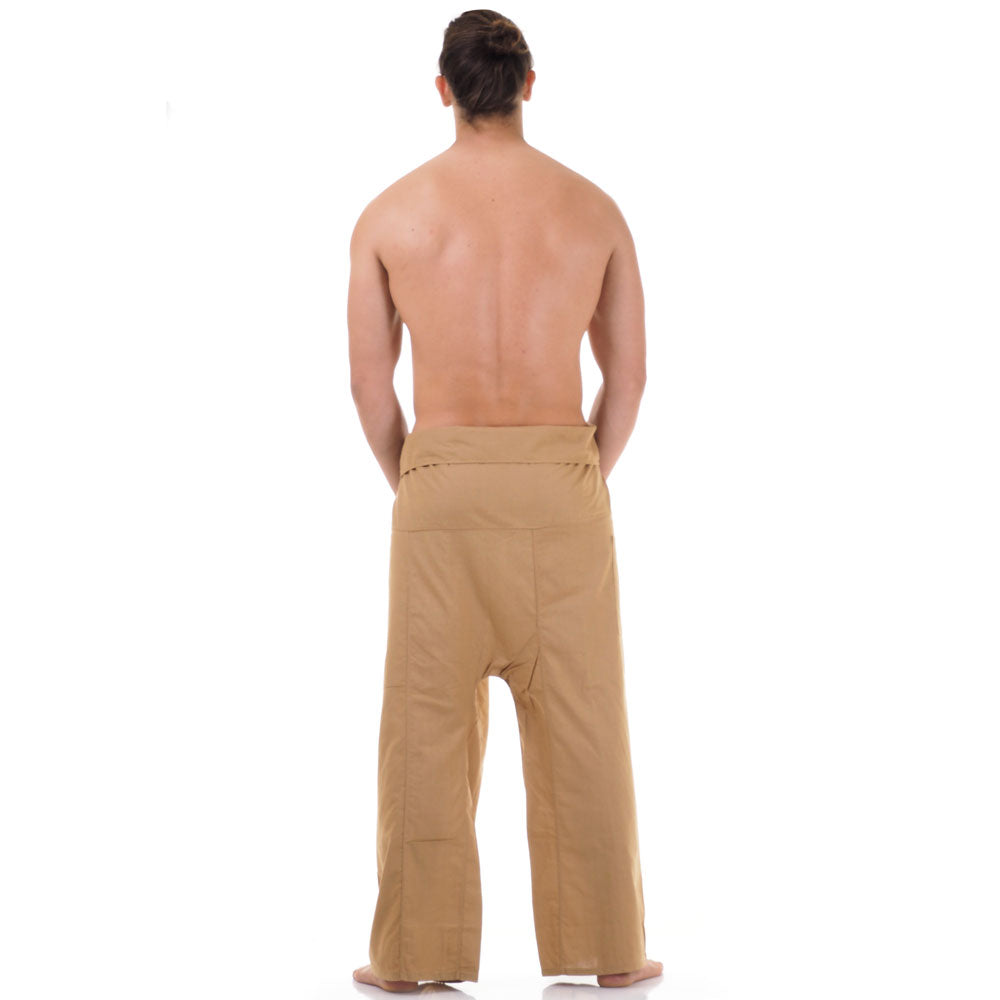 Back view of male model wearing Sandy Beige men's Thai fisherman pants, showcasing the tied waist and flowing fabric.