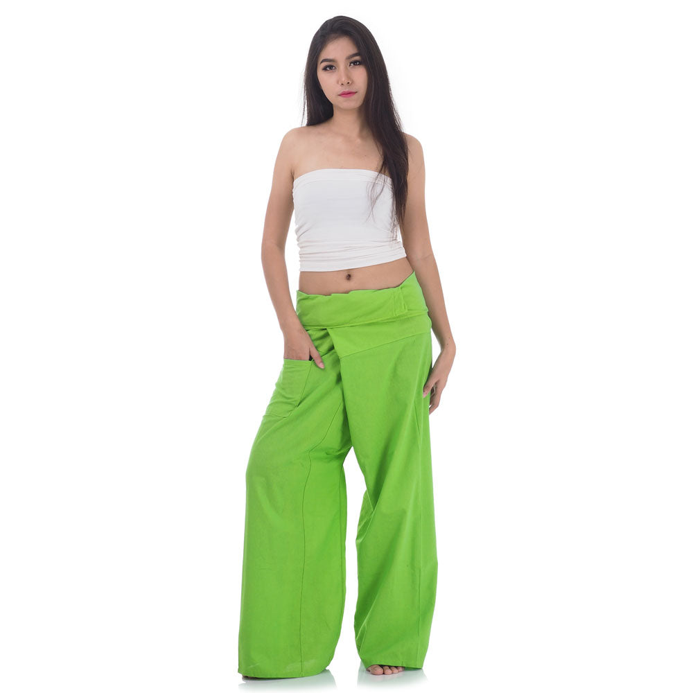 Front view of female model in Tropical Lime Thai fisherman pants, one size fits all S-XL, classic Asian wrap style.