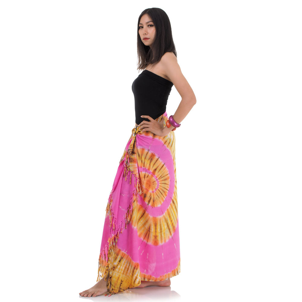 Side view of the pink batik wrap skirt showing the various wrapping possibilities of the pareo.