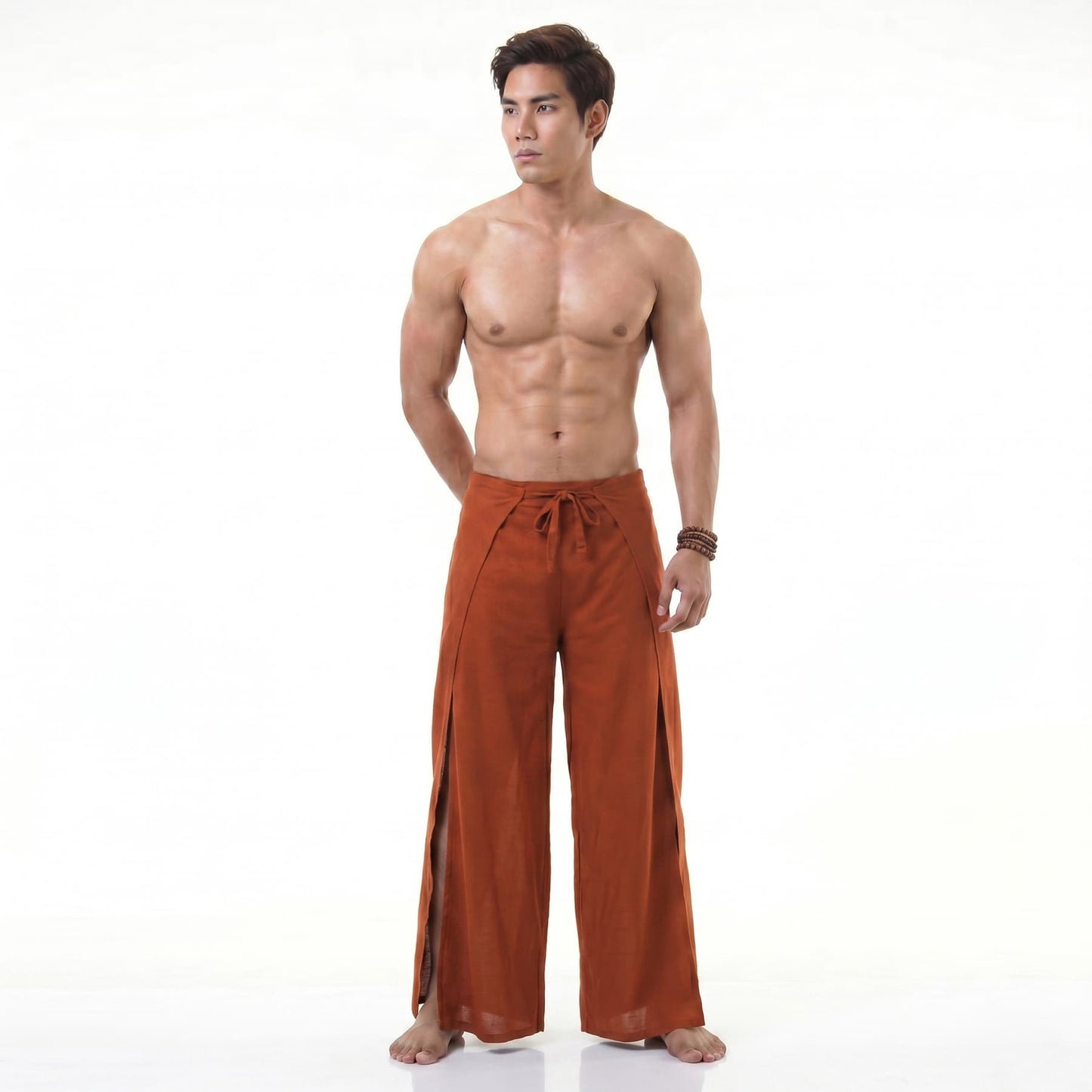 Front view of the orange Thai Fisherman pants for men, bringing a splash of color to summer outfits.
