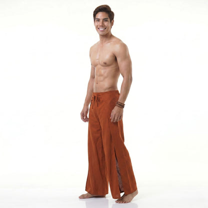 Side profile of the orange wrap pants for men, highlighting the easy-to-tie adjustable fit.