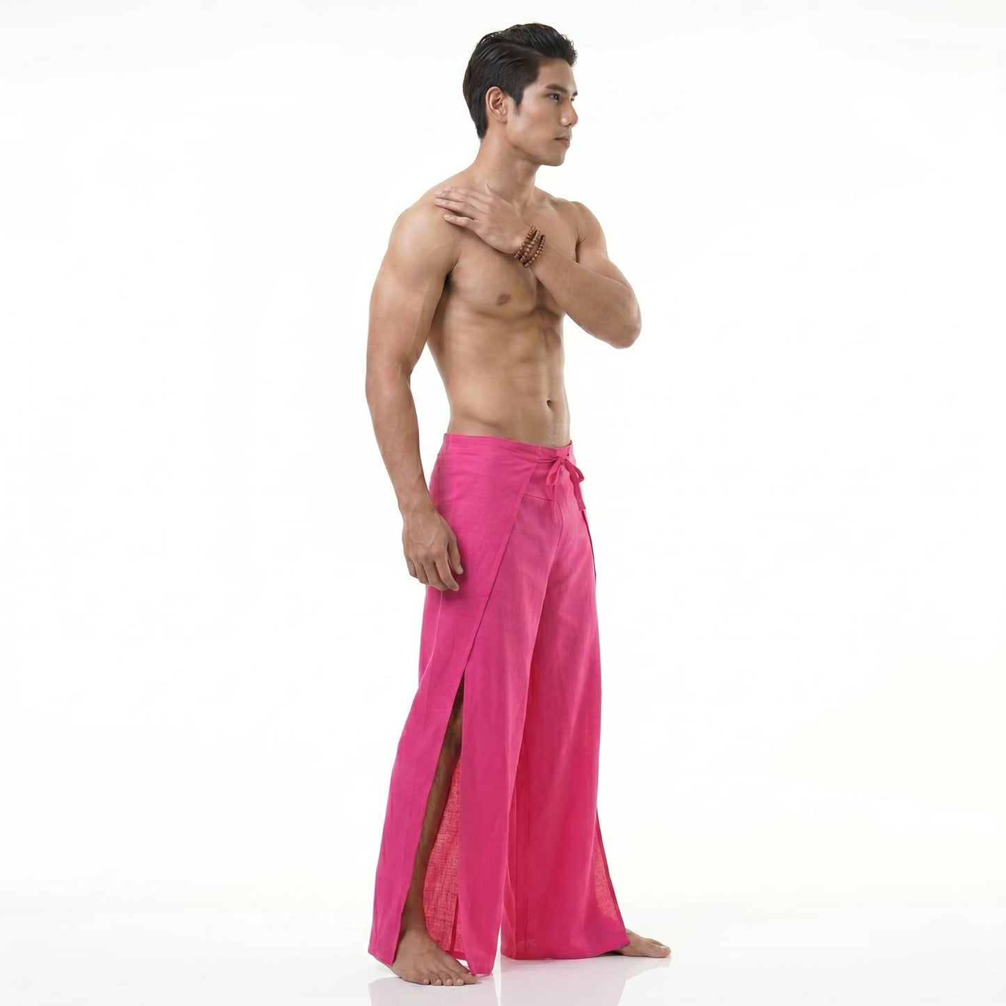 Side profile of the pink Men's Fisherman pants, showcasing the spacious fold-over waist.