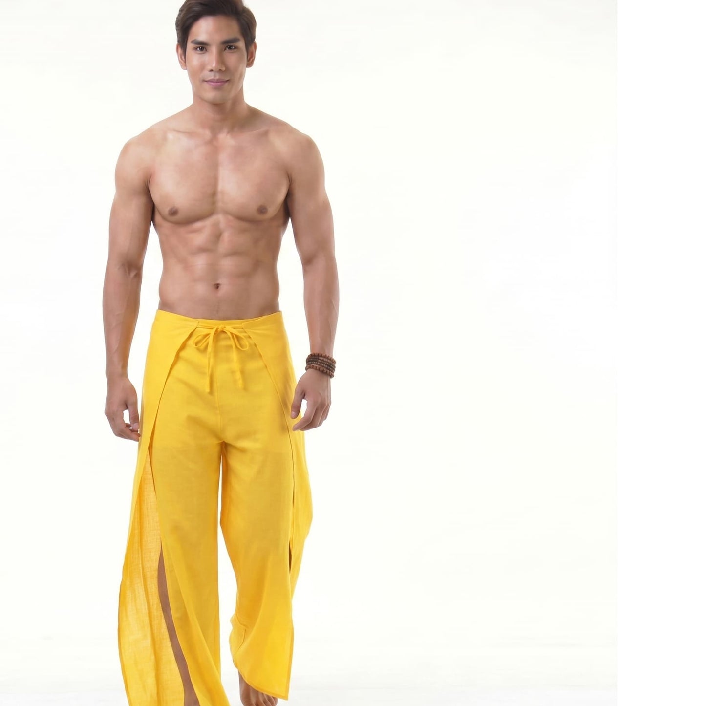 Front view of the yellow Men's Thai Fisherman pants, showing the adjustable waist wrap style.