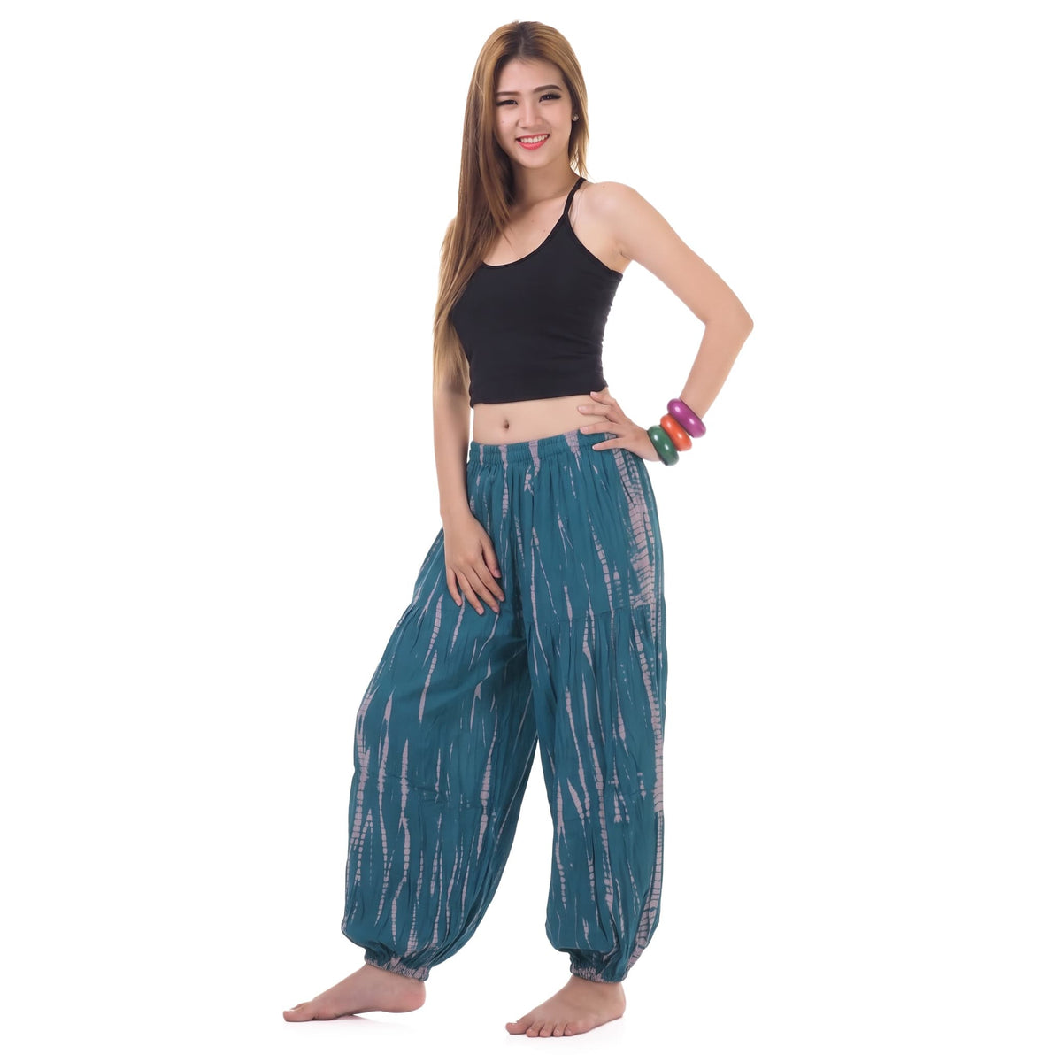 Side view of the Women's Tie Dye Harem Pants Ocean Breeze, displaying the wide balloon leg cut and comfortable drape.