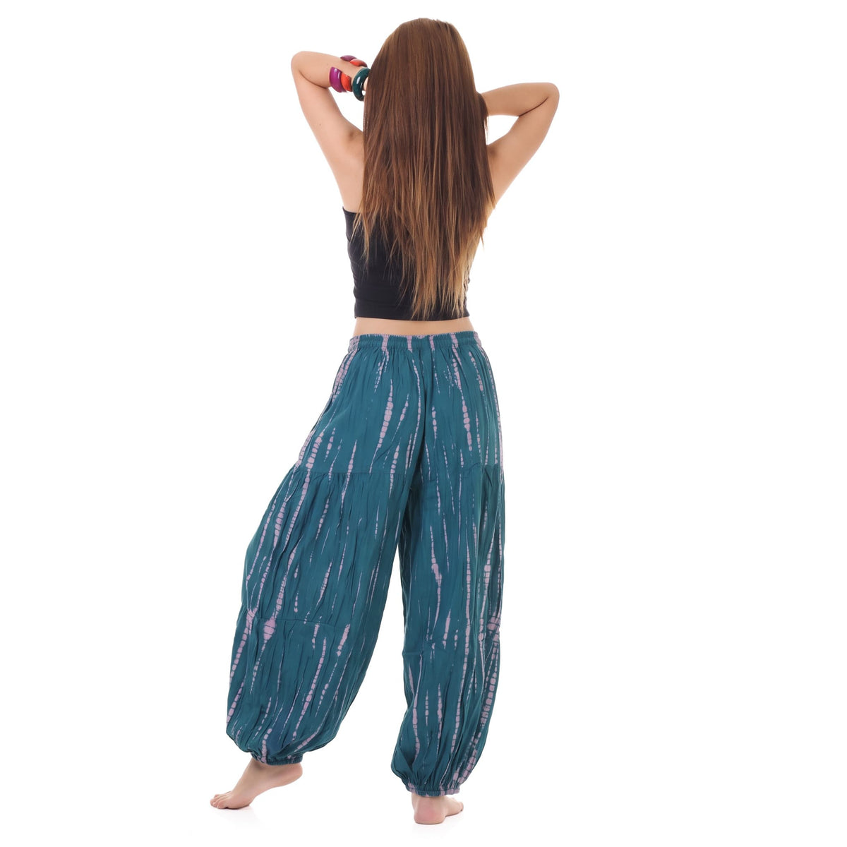 Back view of the Women's Tie Dye Harem Pants Ocean Breeze on a female model, illustrating the lightweight and breathable design.