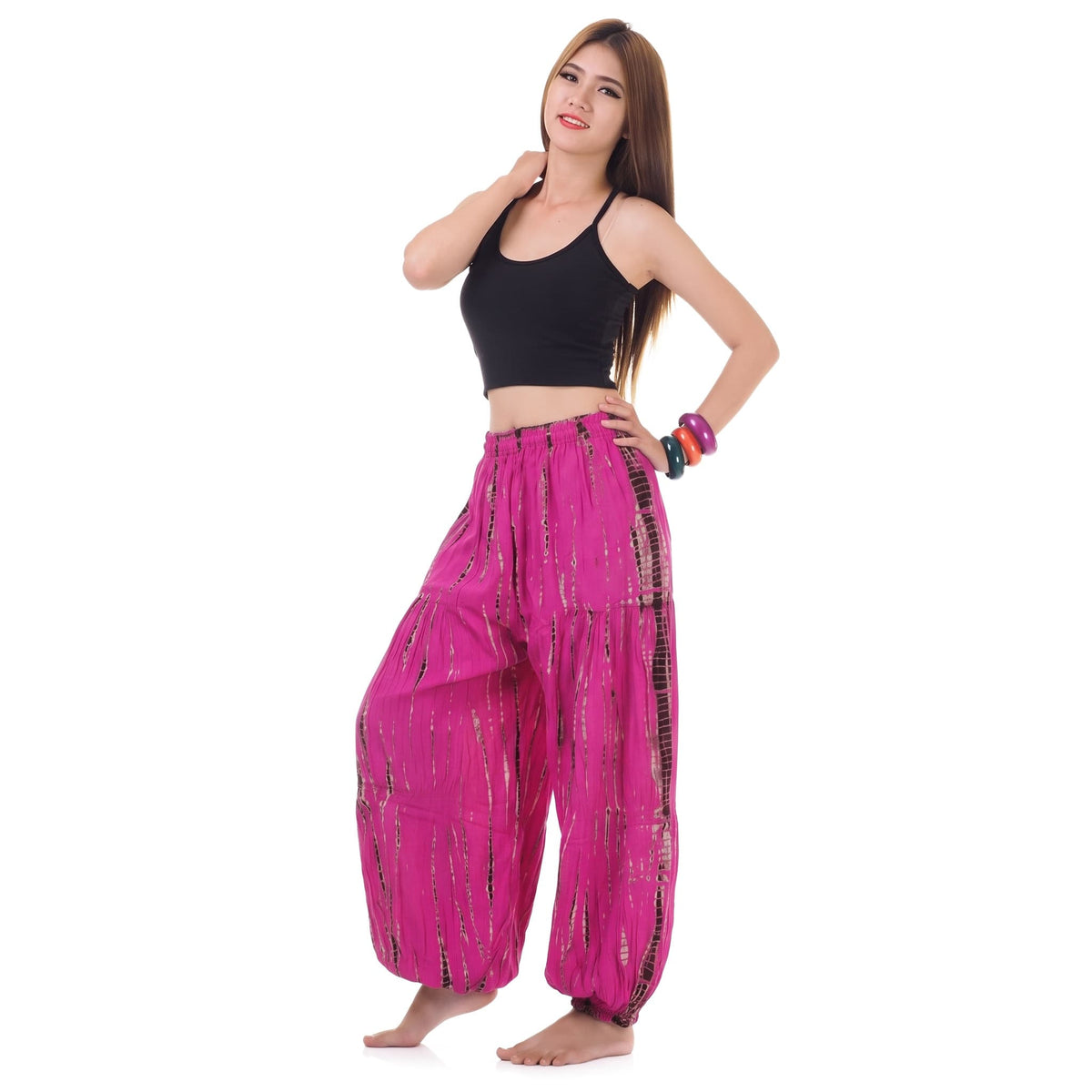 Side view of the Tie Dye Women's Harem Pants Lotus Bloom, showing the generous flare and flexible movement.