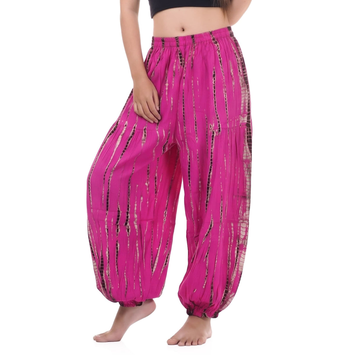 Close-up texture of the Tie Dye Women's Harem Pants Lotus Bloom, featuring the radiant pink tie-dye pattern.