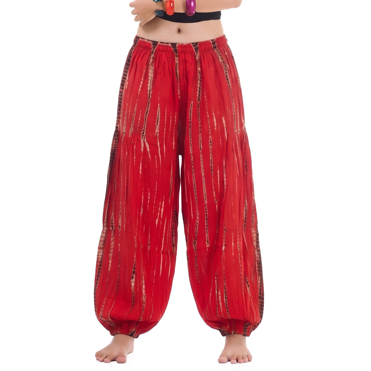 Macro close-up shot of the Vibrant Red Tie Dye material, highlighting the rich red tones and handcrafted pattern.