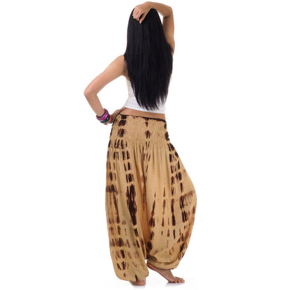 Back view of beige boho pants, elastic waistband for perfect fit.
