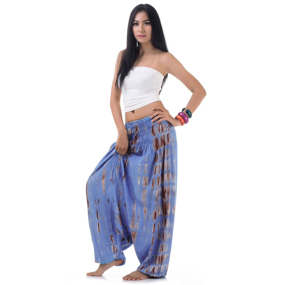 Side view of blue 2-in-1 harem pants highlighting the versatile jumpsuit fit.