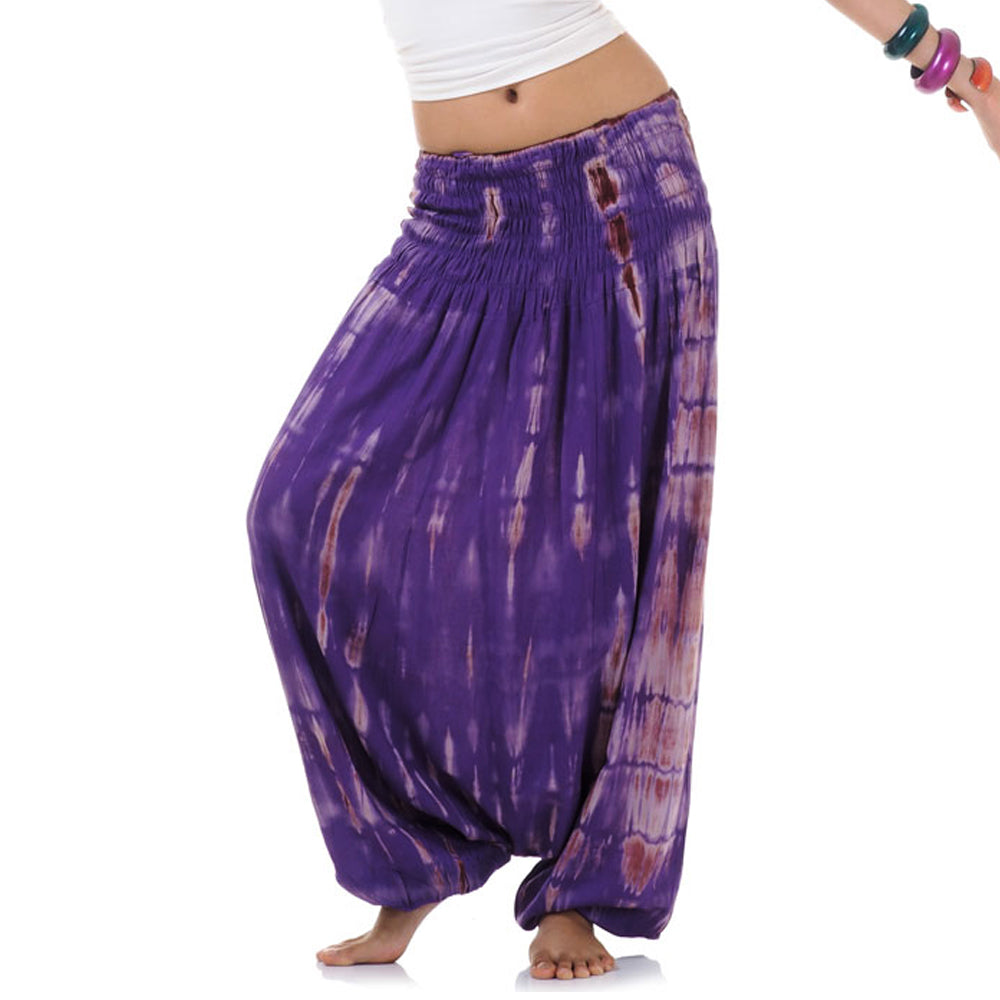 Close-up purple tie dye 2-in-1 harem pants, artistic handmade design.
