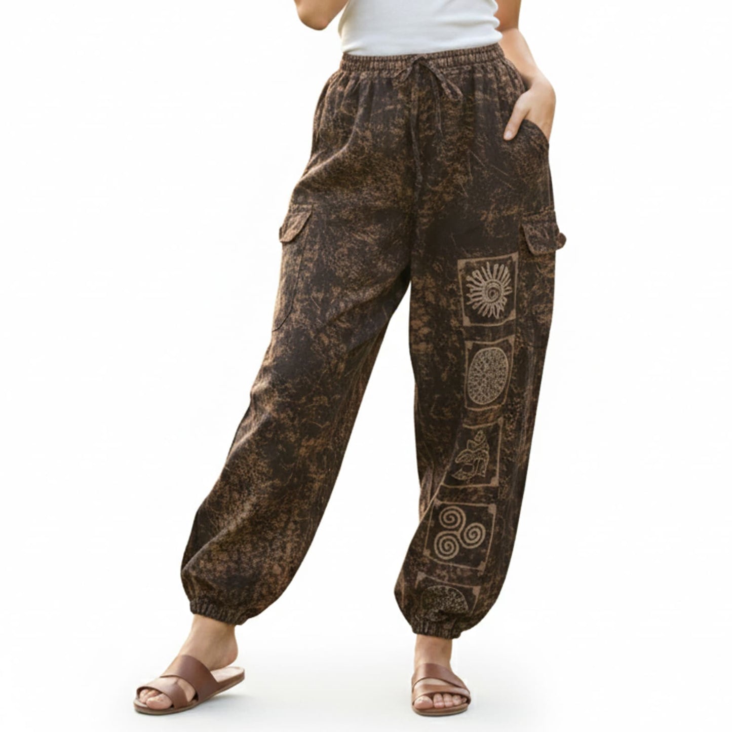 Close-up shot of brown stonewashed tribal mandala harem pants showing natural cotton and cargo pocket detail.