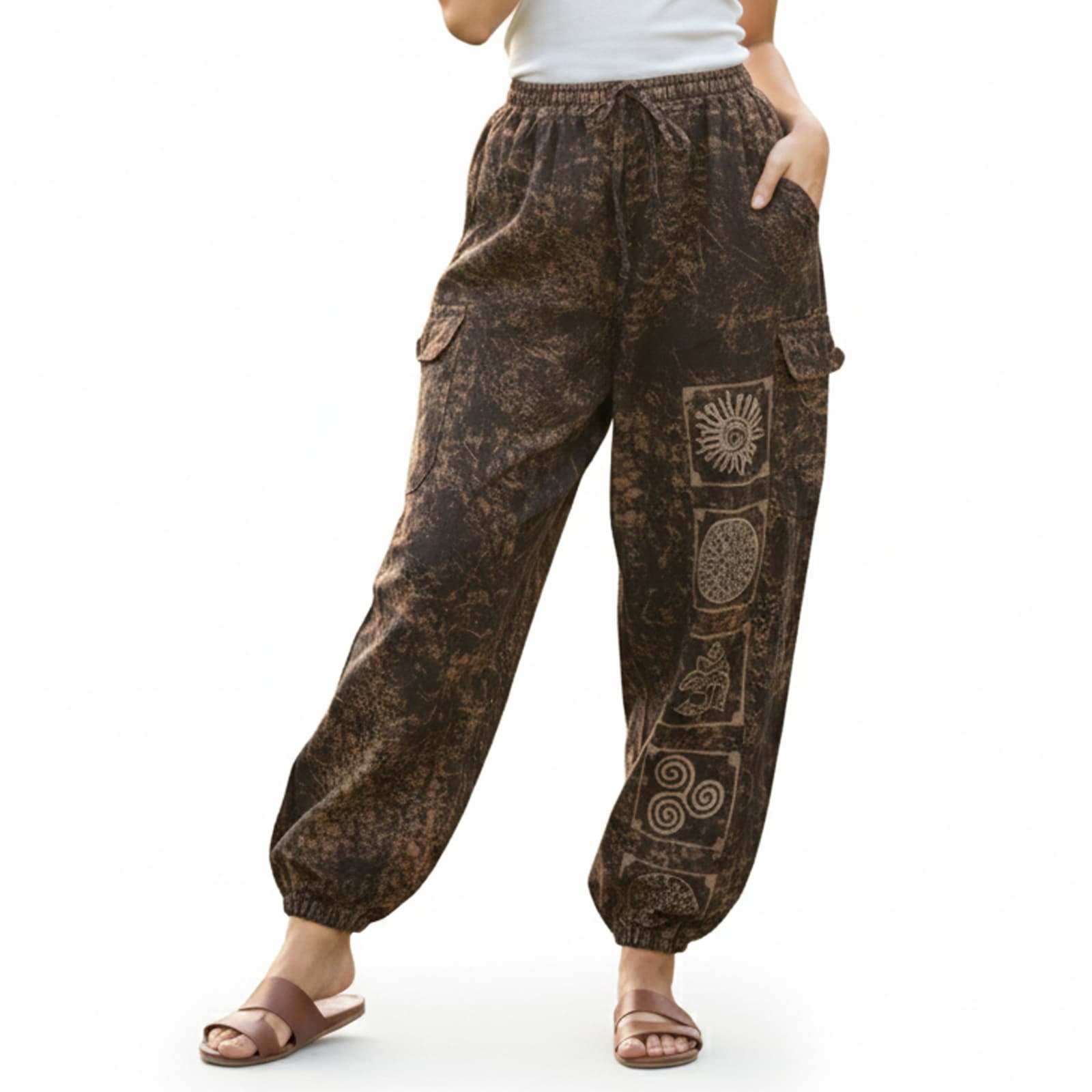 Close-up shot of brown stonewashed tribal mandala harem pants showing natural cotton and cargo pocket detail.