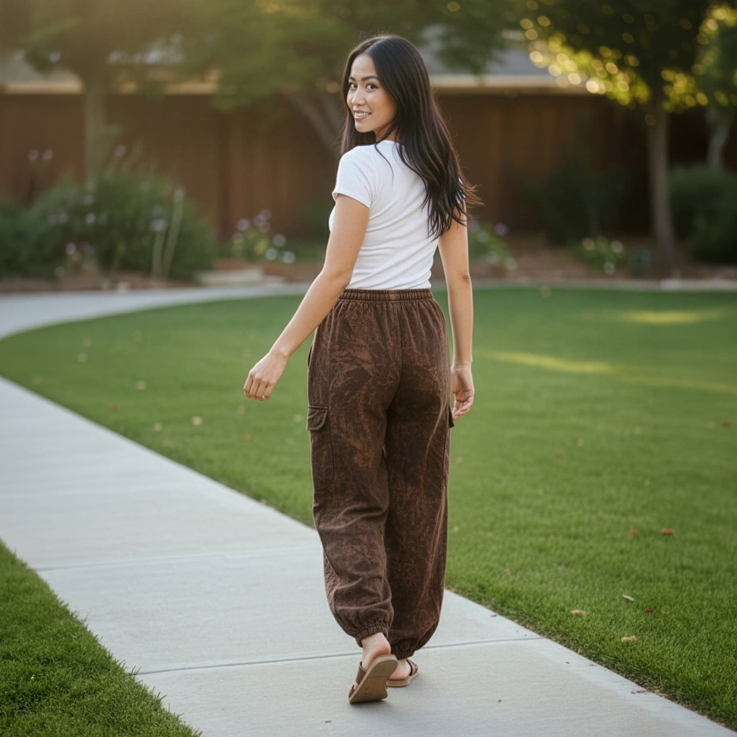 Back view of brown boho tribal om harem pants highlighting the comfortable elastic waistband.