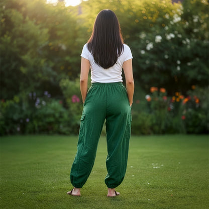 Back view of green boho tribal om harem pants highlighting the elastic ankle cuffs.