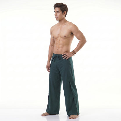 Side view of the turquoise wrap pants for men, emphasizing freedom of movement.