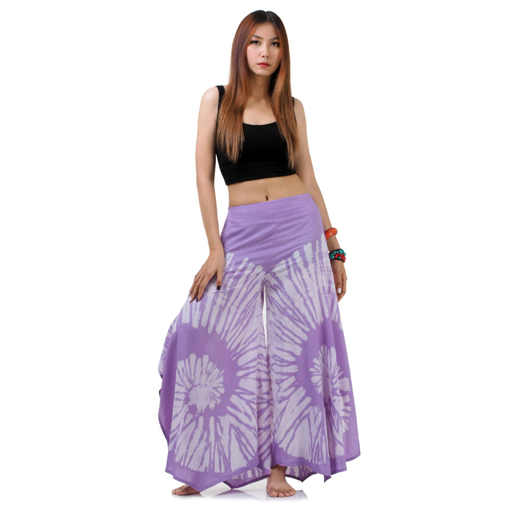 Full-length front shot of a female model wearing the Vibrant Violet Hippie Tie Dye Palazzo Pants with a stretchy smocked waistband.