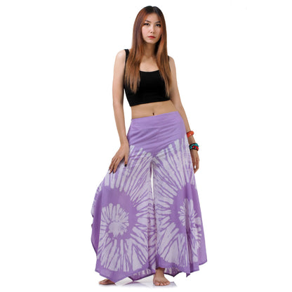 Full-length front shot of a female model wearing the Vibrant Violet Hippie Tie Dye Palazzo Pants with a stretchy smocked waistband.