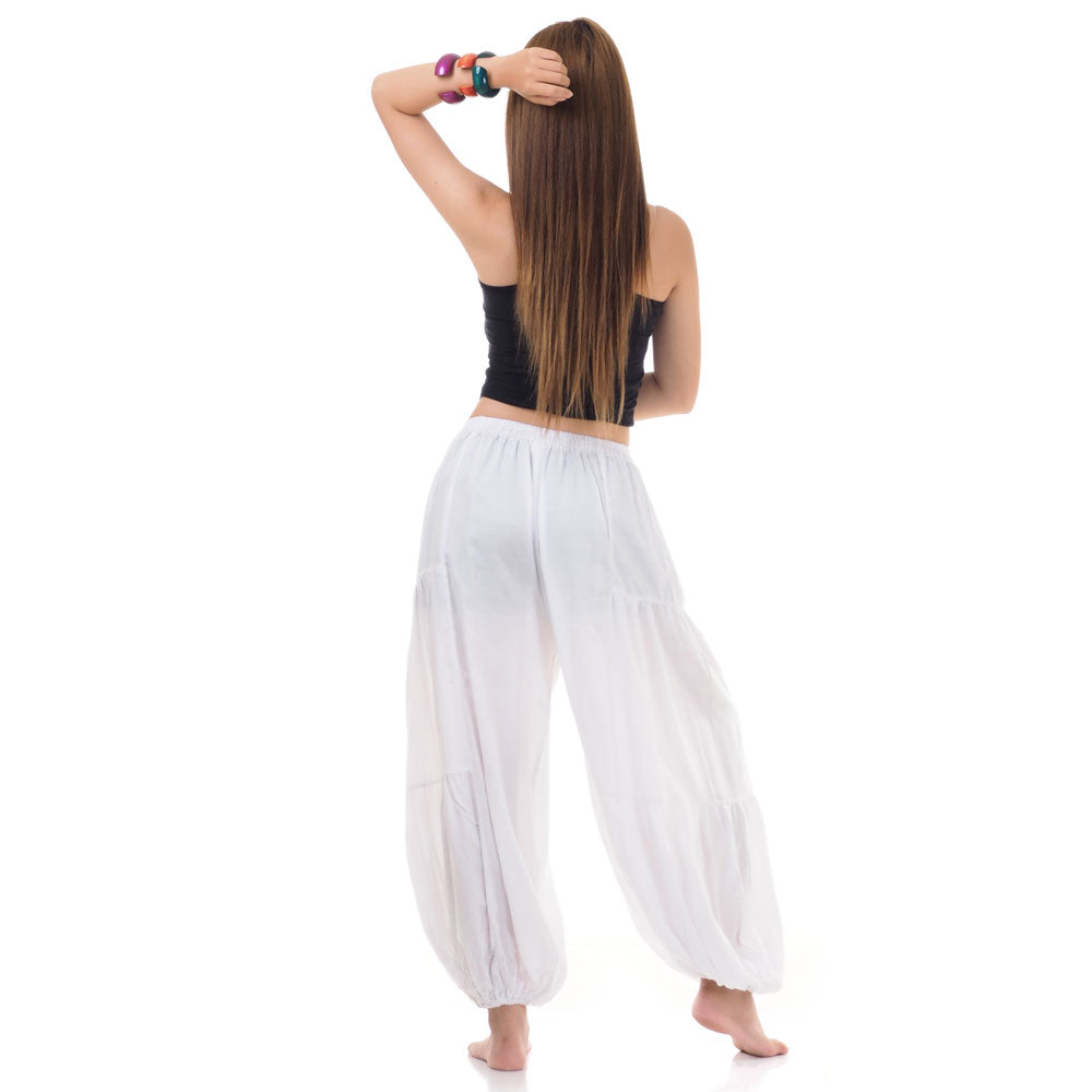 Back view of white women Thai yoga harem pants worn with black shirt