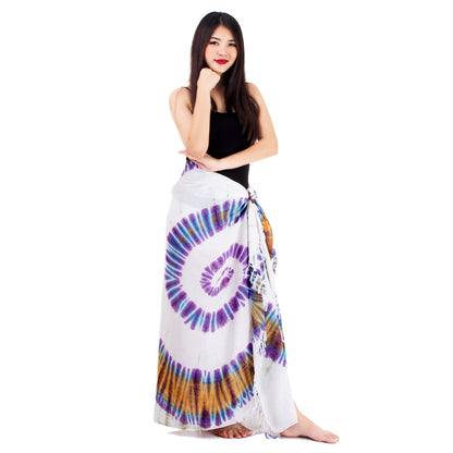 Side view of the white batik sarong Phangan showing the flowing movement of the fabric and leg slit.