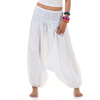 Close-up of a white thai 2-in-1 jumpsuit harem pants