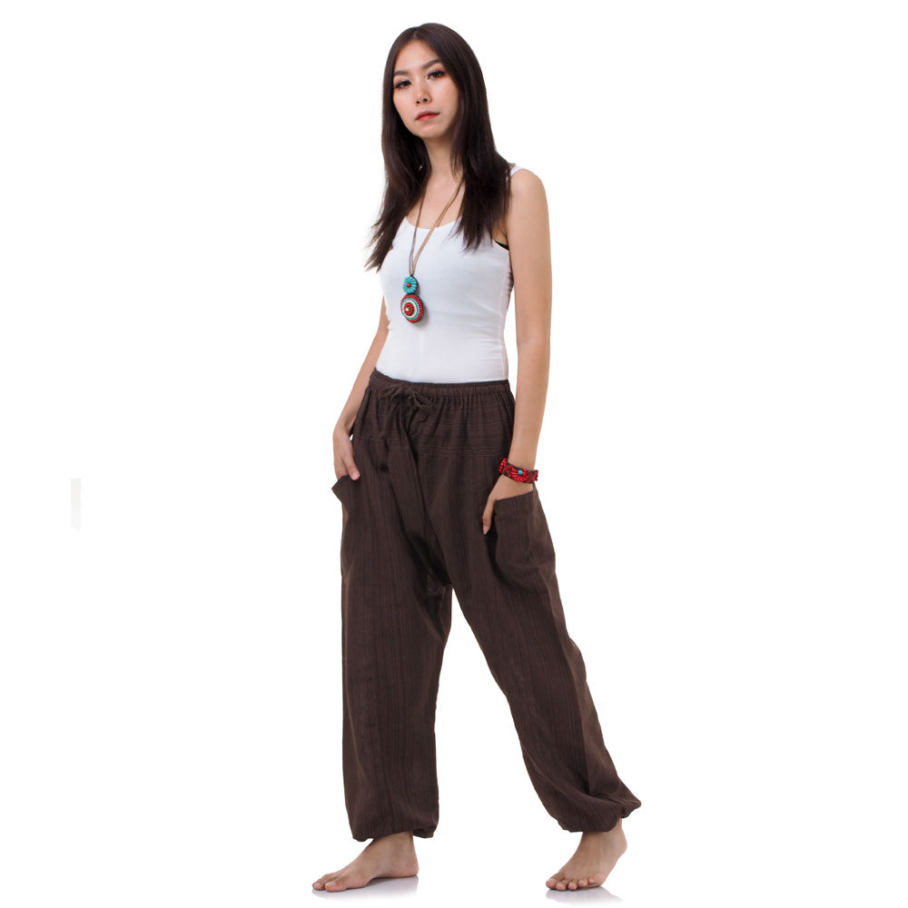 Side view of the Earthy Brown pants, illustrating the loose fit and earthy aesthetic.