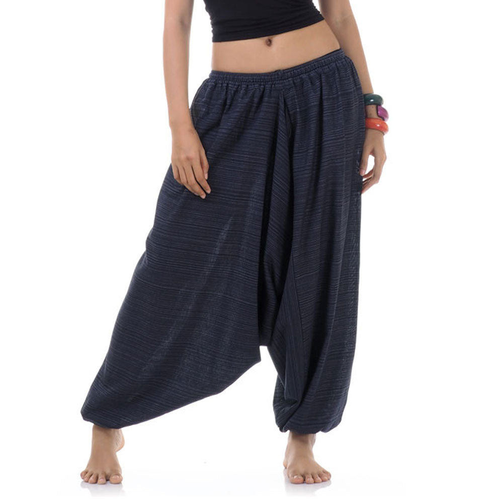 Close-up of a blue women pinstripe drop crotch thai harem pants