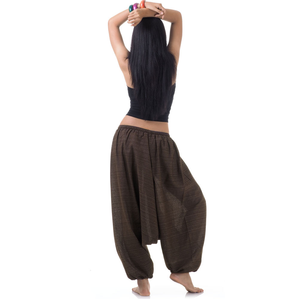 Back view of brown women pinstripe drop crotch thai harem pants worn with black top