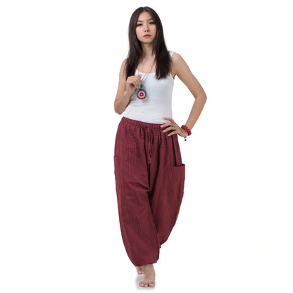 Front view of the Women's Pinstripe Harem Pants Sunset Maroon, fitting sizes S to M.