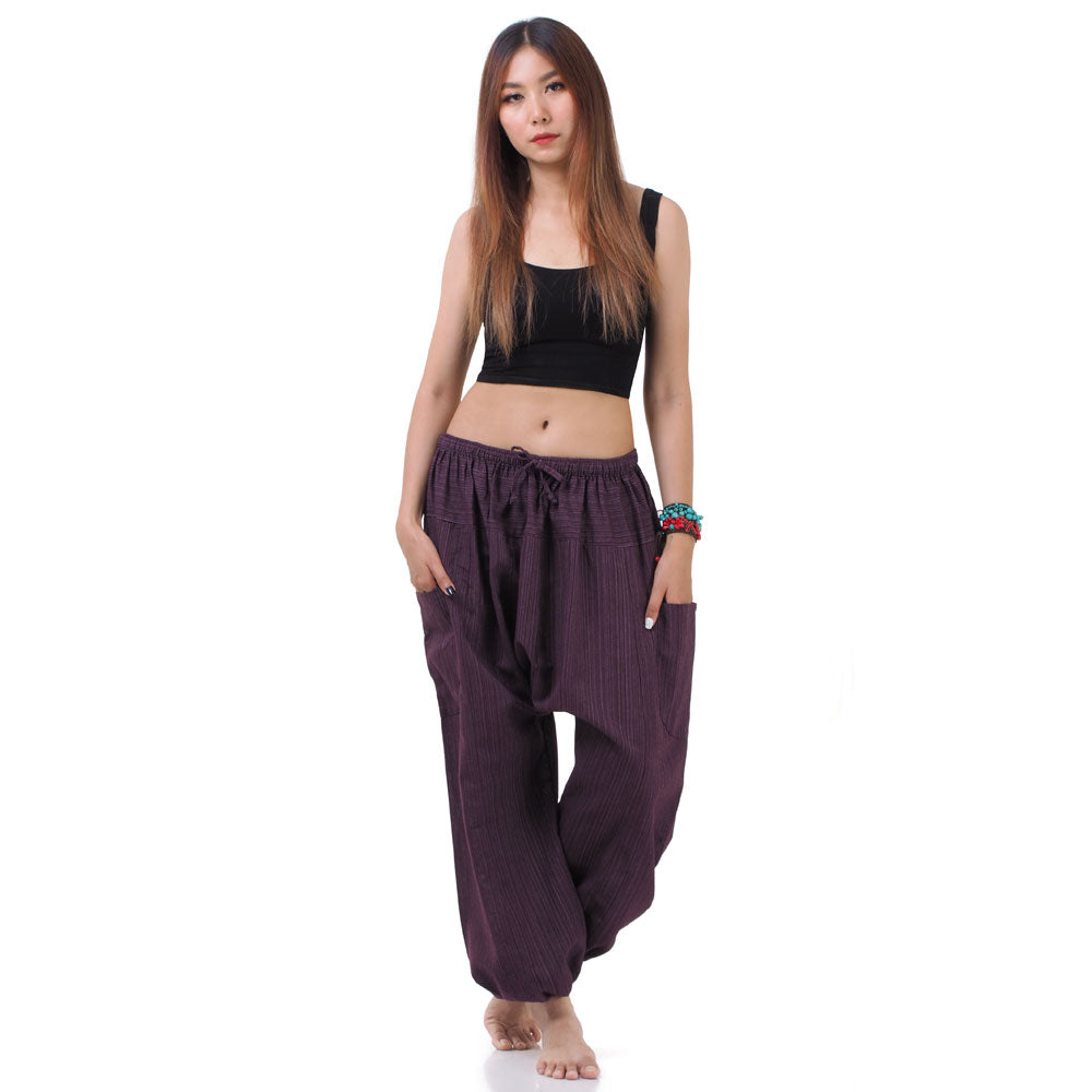 Front view of the Women's Pinstripe Harem Pants Purple Orchid with elastic waistband and pockets.