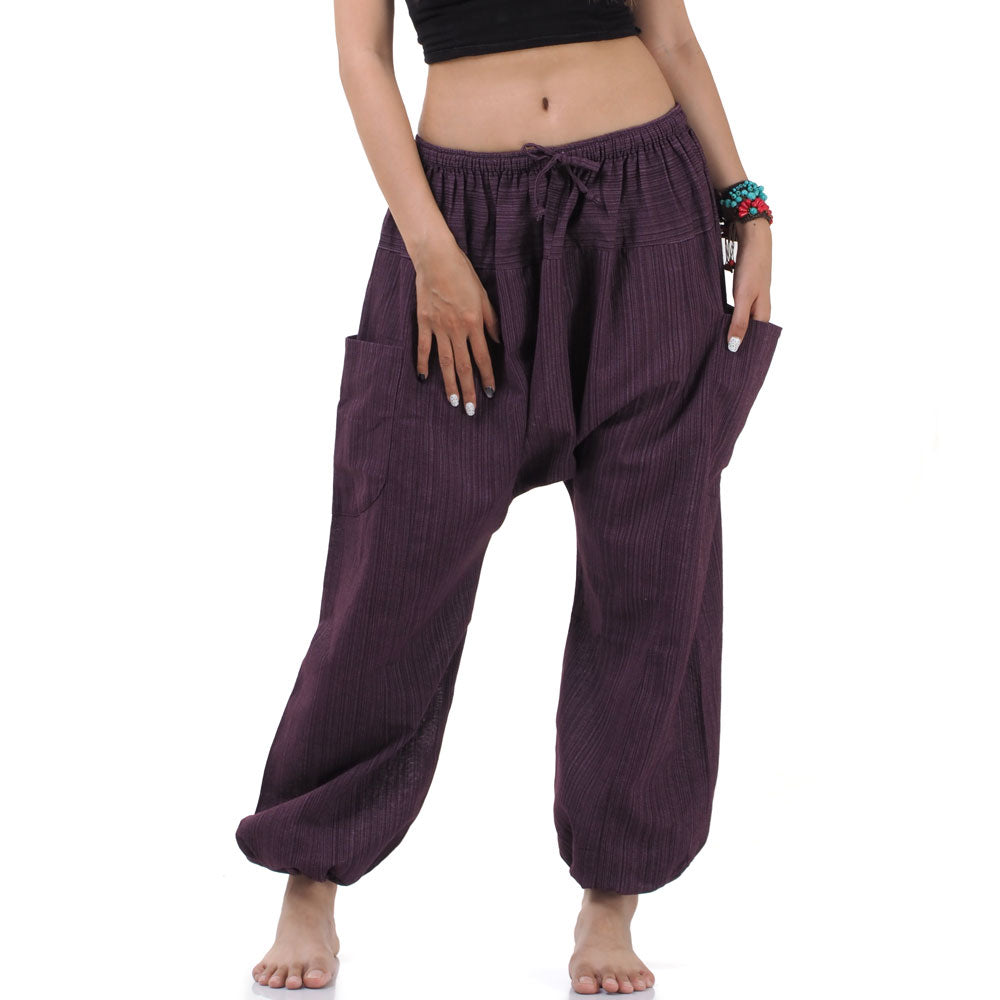 Close-up of the Purple Orchid pinstripe harem pants, showing the handcrafted 100% natural cotton texture and fine stripes.